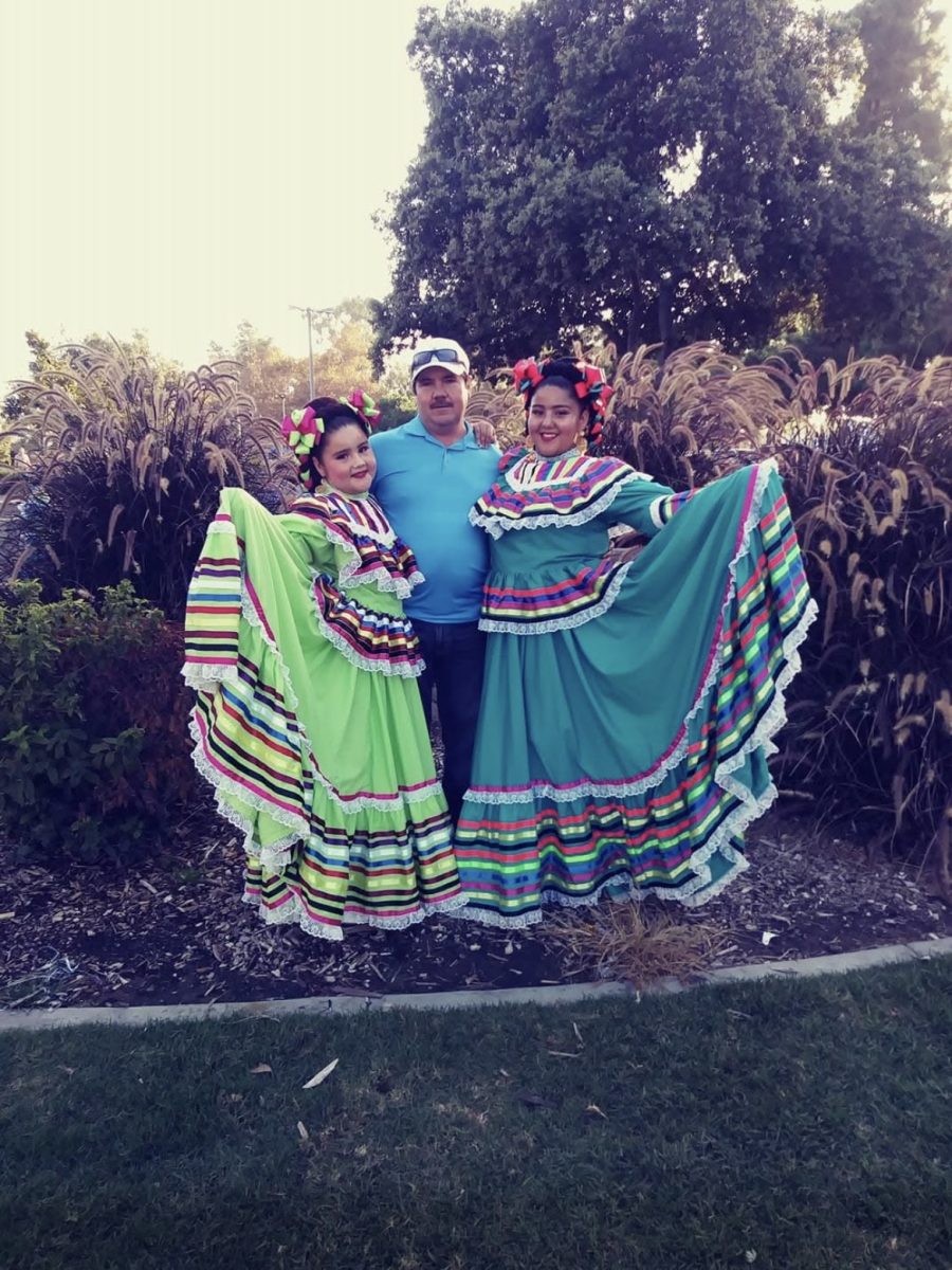 Cytlaly, age 10, poses with her father Gerardo Ruiz and her sister Heidi Ruiz.