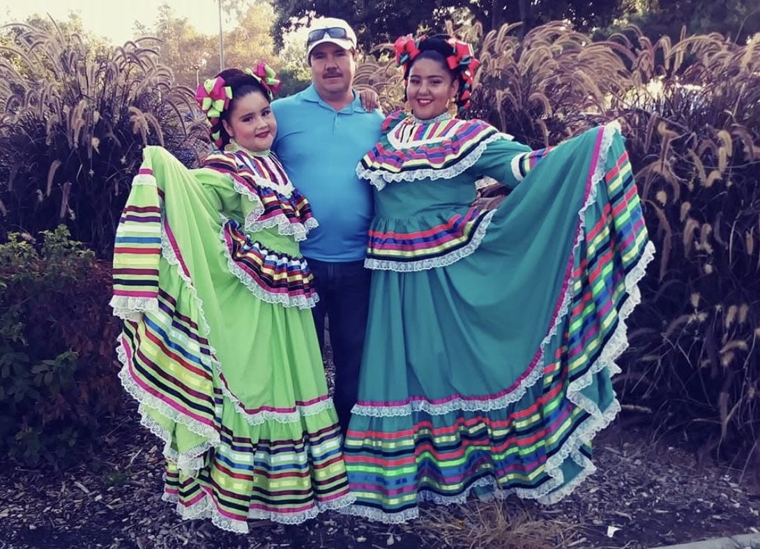 Cytlaly, age 10, poses with her father Gerardo Ruiz and her sister Heidi Ruiz.