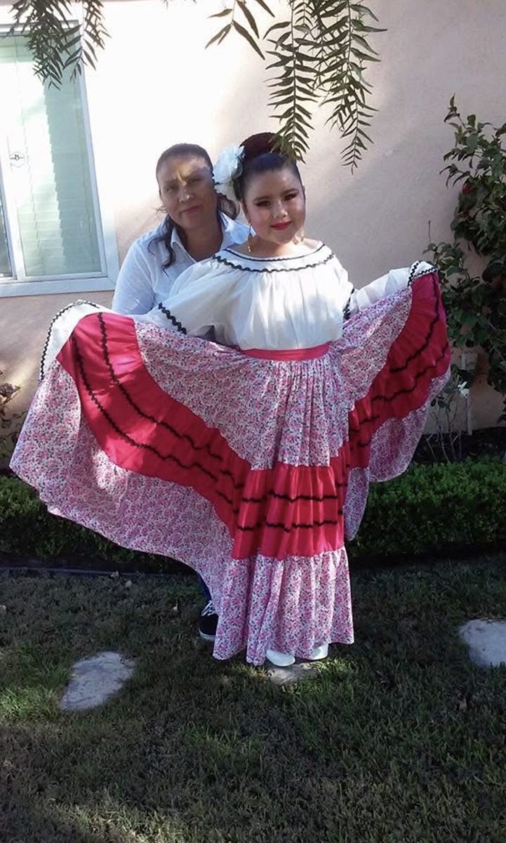  Cytlaly, age 8, poses with her mother Maricela Velazquez.
