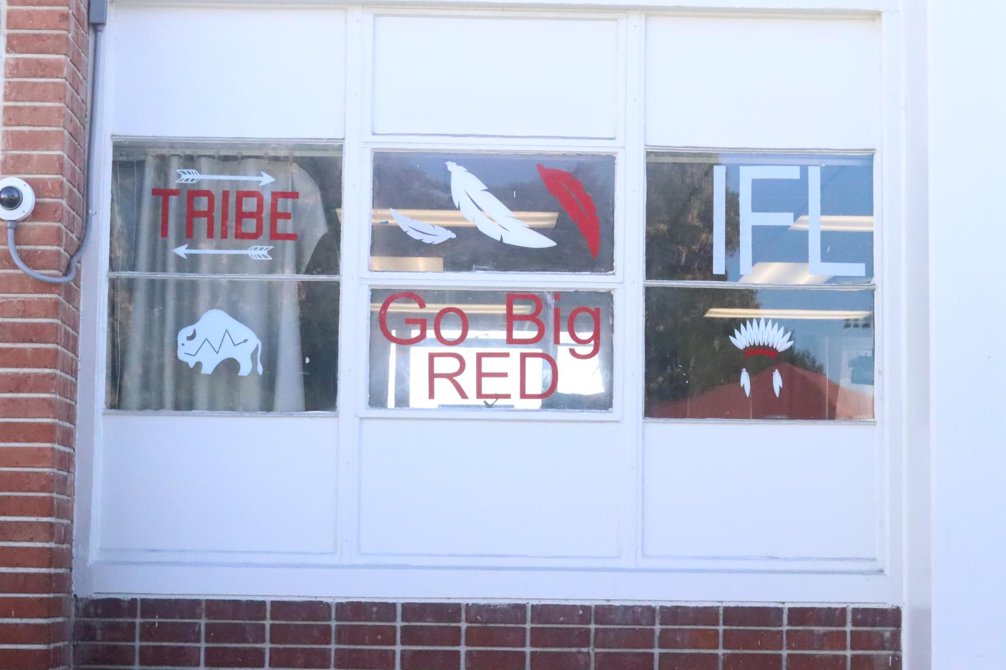 The school tries to maintain the mascot through smaller, less explicit imagery, like stickers on the ASB windows.