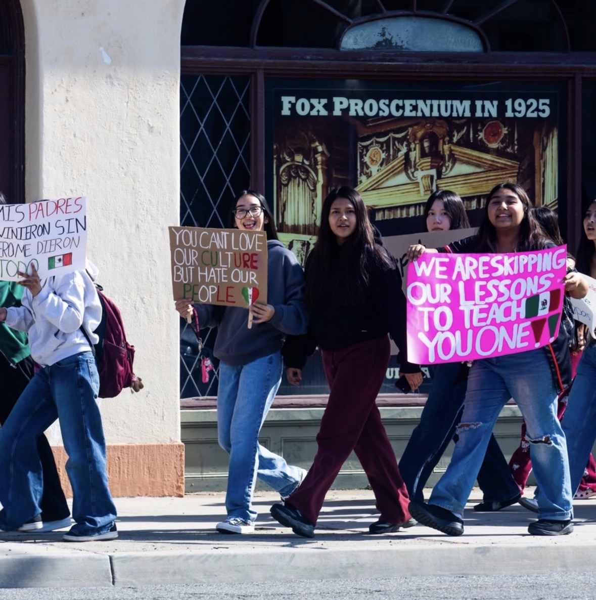 Students protest on Harbor Blvd outside of Fox Theater.