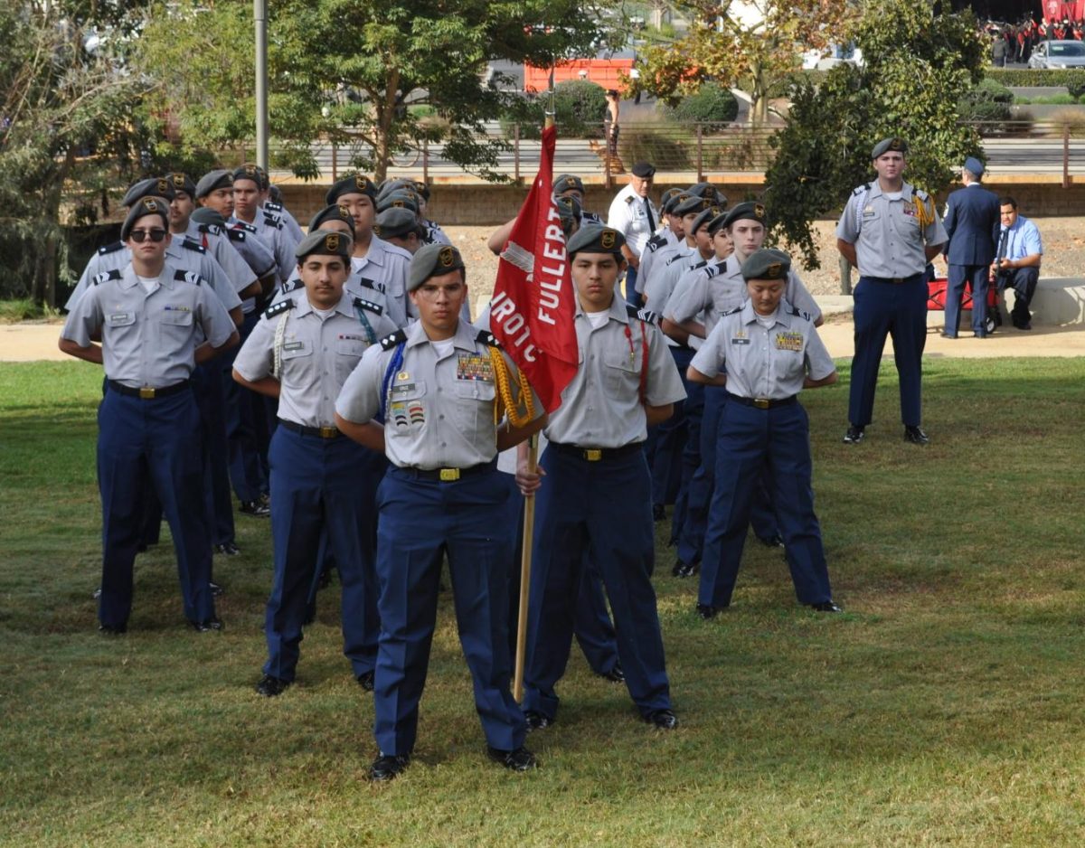 JROTC cadets stand in formation waiting to receive instruction from Battalion Commander Ian Cruz during Fullerton's Veterans Day Parade on Nov. 11, 2025.